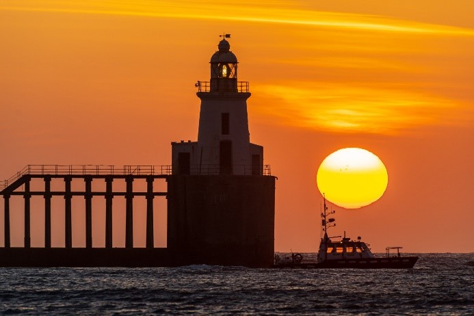 Blyth Lighthouse Just After Sunrise, by John Fatkin
